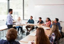 The College Readiness Crisis Hits Elite Campuses Teacher speaking to students in a classroom discussion