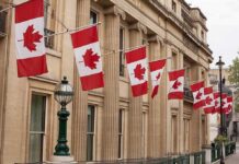 Deal Tease at Midnight — Tariffs On Ice Canadian flags on a neoclassical building facade