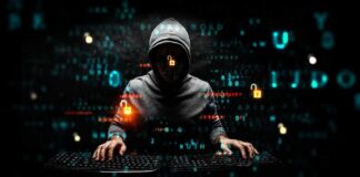 hooded figure typing on dual keyboards amid glowing code