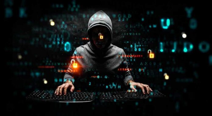 hooded figure typing on dual keyboards amid glowing code