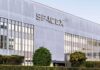 SpaceX’s Latest Launch Just Hit the Brakes SpaceX headquarters exterior with large logo and windows