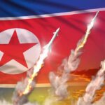 North Korean flag with missiles launching and smoke trails