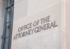 Blanche’s DOJ Bid Survives by the Skinniest Margin Office of the Attorney General building sign on stone wall