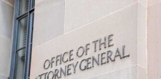 Office of the Attorney General building sign on stone wall