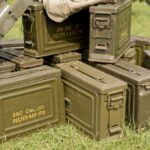 Why China Suddenly Banned Military Surplus Sales Stack of green military ammunition boxes on grass