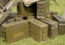Why China Suddenly Banned Military Surplus Sales Stack of green military ammunition boxes on grass