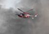 Daring Rescue Unfolds 600 Feet Below Safety Rescue helicopter hovers amid thick smoke