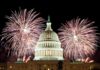 United States Capitol with fireworks at night