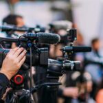 A Sweeping Transparency Promise Follows GOP Victory Video cameras on tripods at a media event