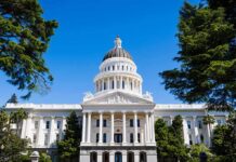 California’s Billionaire Tax Fight Hits the Ballot State capitol building with white dome and columns framed by trees