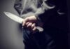 Pedophile Claim, Five-Year Shock Sentence person holding a large knife behind their back