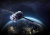 New Satellites Track Yields, Squeeze Markets Satellite orbiting Earth over night side