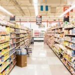 Can Government Really Make Groceries Cheaper? A grocery store aisle filled with various food products on shelves