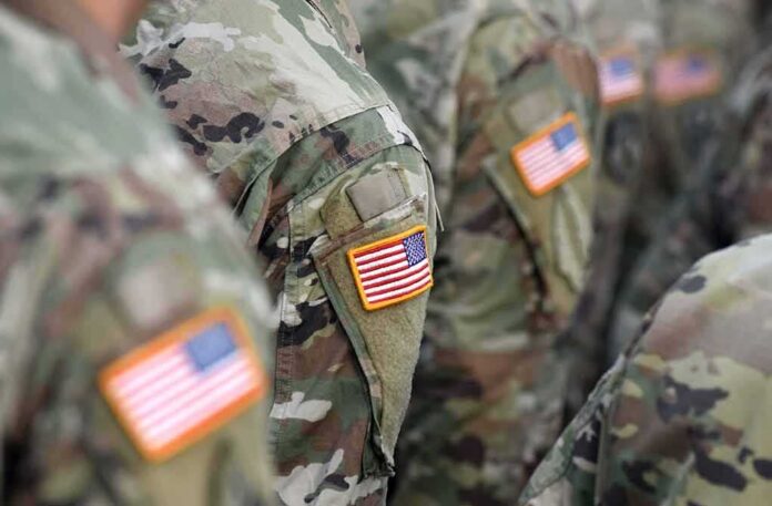 U.S. flag patches on camouflage military uniforms