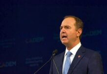 A Trump Rival Just Found Common Ground Man in suit speaking at a podium