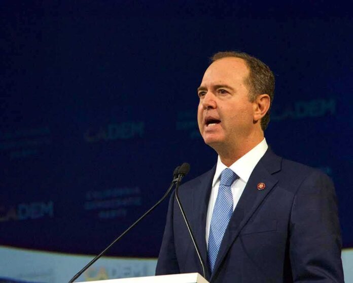 Man in suit speaking at a podium