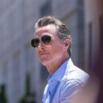 Gavin Newsom wearing sunglasses outdoors