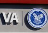 VA logo and Department of Veterans Affairs seal on building wall