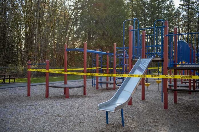 shutterstock_1699954372-1 Playground equipment wrapped with caution tape