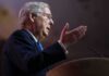 Senate Stunner: Where’d McConnell Go? elderly man in suit speaking at a podium