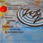 Japan Centralizes Spy Agencies To Counter China Map of Taiwan with red pin and earthquake icon