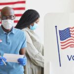 Twenty-Seven Years in Washington Ended Last Night Voters wearing masks at a polling station