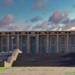 Turkey Locked Down For NATO’s Biggest Gathering Government building with columns and Turkish flag at sunset