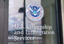 Door with U.S. government seal and office lettering