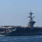 Morale Craters? Navy Denies, Trump Presses Aircraft carrier cruising at sea