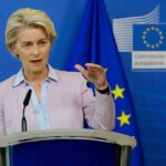 Europe Changes Course On Ukrainian Refugees Speaker at podium during EU press conference