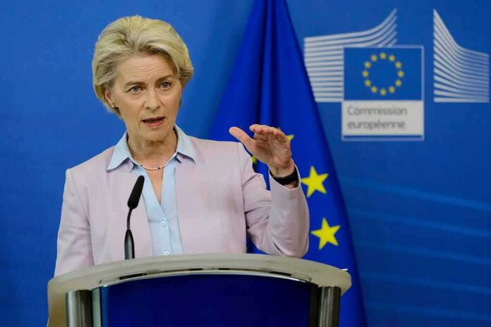 shutterstock_2198915239 Speaker at podium during EU press conference