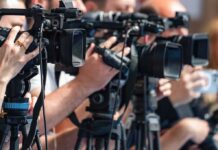 Trump Reopens the Fight Over Birthright Citizenship television cameras on tripods at a media event