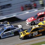 Sepsis Strikes: Racing Icon Gone Too Soon Stock cars racing side by side on a banked track