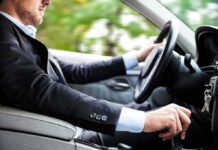 The Interview Ended. Then Things Got Dangerous Driver in a suit operating a car