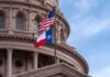 Texas Voters Face a Closely Watched Senate Choice Texas and U.S. flags in front of a capitol building dome