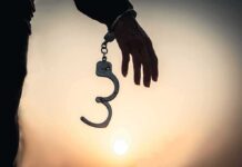 Serious Felony Charges, Yet a Suspect Walks Free Hand with open handcuff in silhouette at sunset