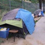 They Marched Over Rent. Then Came the Tents Tent encampment along a city sidewalk