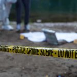 Desert Graves Horror Baffles LA Detectives Police crime scene with yellow tape and forensic team