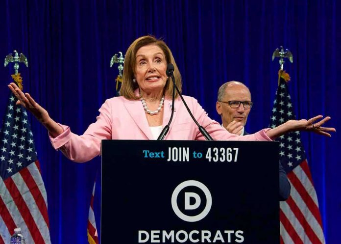 woman at podium with arms outstretched during speech