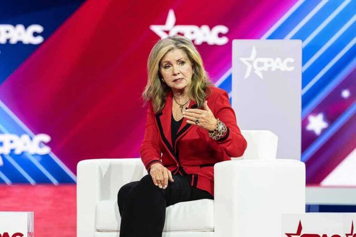 shutterstock_2269917027 Marsha Blackburn speaking on stage at CPAC