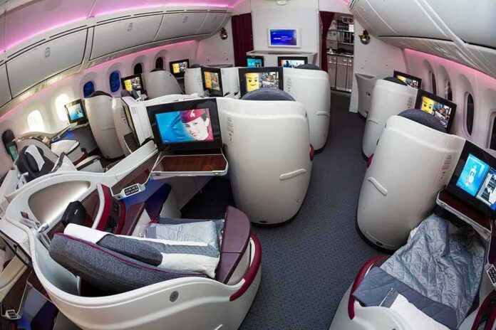 shutterstock_402960826 Business class cabin with lie-flat seats and personal screens